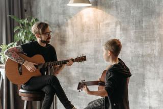 Prendre des cours de guitare avec un professeur